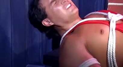 Muscular man Vincenzo is bound with rope
