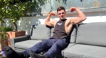 Ripped & Muscular Stud Tristan Flexing outdoors